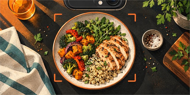 Illustration of a meal framed for capture alongside a phone.